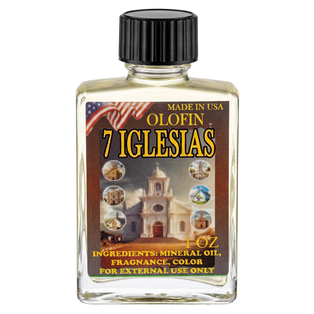 A 1 oz bottle of Olofin 7 Iglesias mineral oil fragrance, featuring a clear glass bottle with a black ribbed cap and a detailed label depicting a church and an American flag.