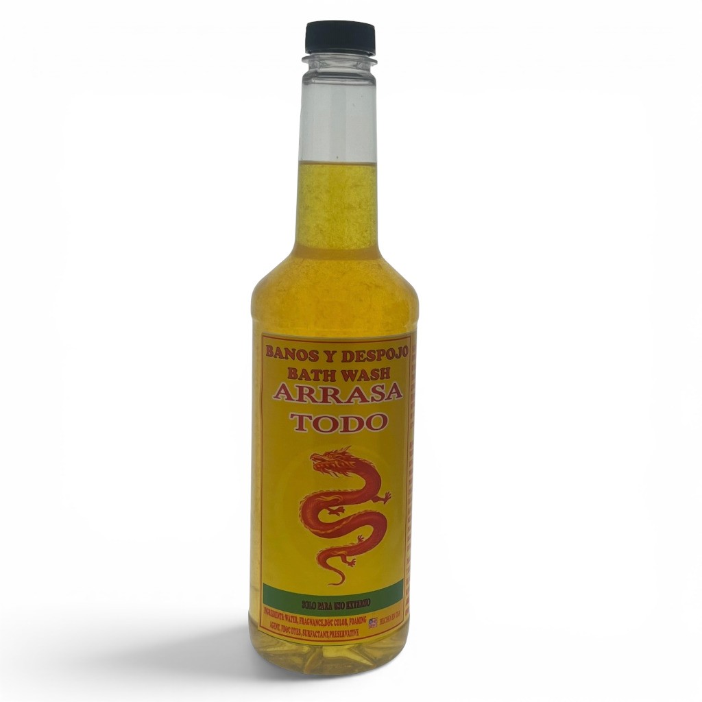 A bottle of Arrasa Todo bath wash with a yellow liquid inside, featuring a yellow label with a red dragon graphic and black cap, on a white background.