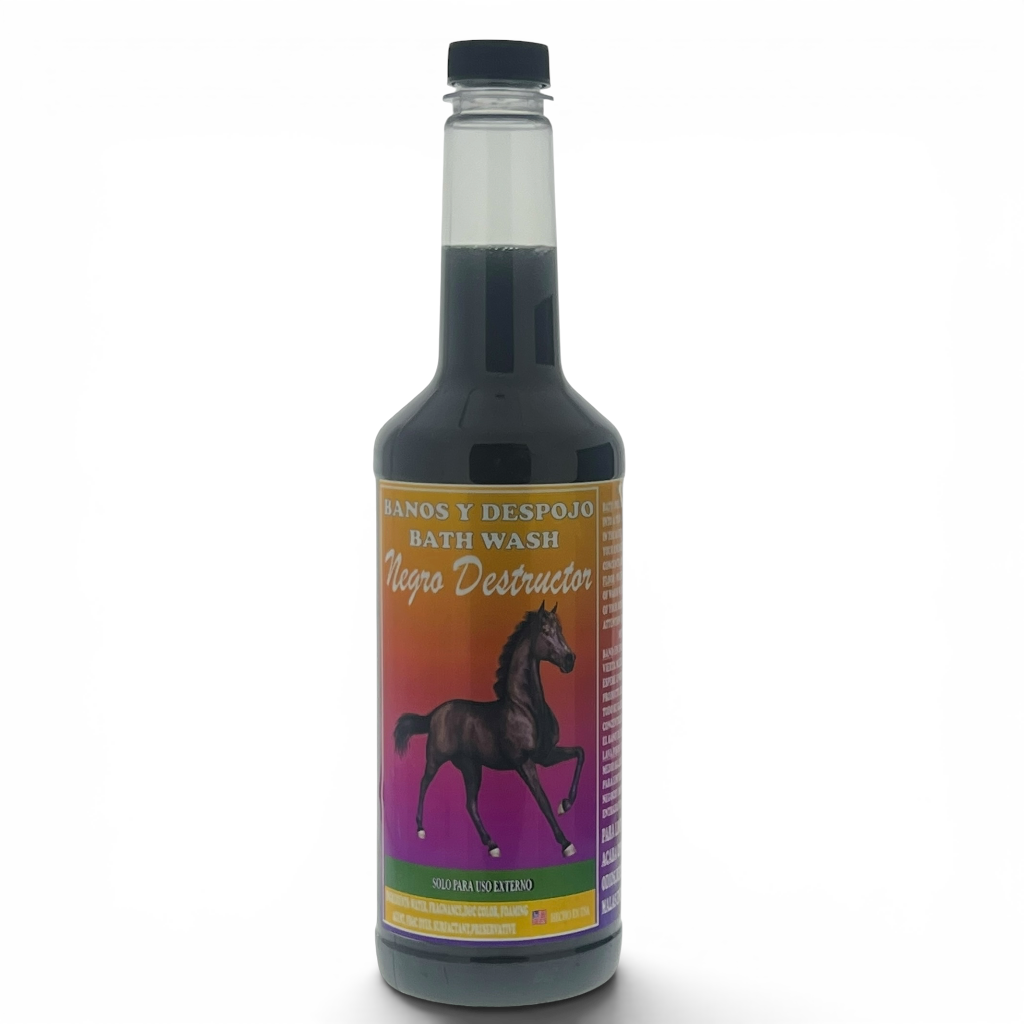 A bottle of 'Negro Destructor' bath wash by 'Manos y Despojo' against a plain white background. The bottle is filled with a very dark liquid and features a colorful label with a black horse illustration.