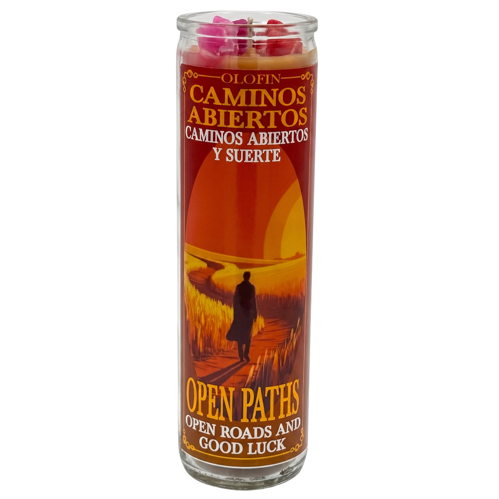 A tall glass prayer candle with a red and orange label reading 'Olofin Caminos Abiertos y Suerte' and 'Open Paths: Open Roads and Good Luck,' topped with pink wax pieces, on a plain white background.