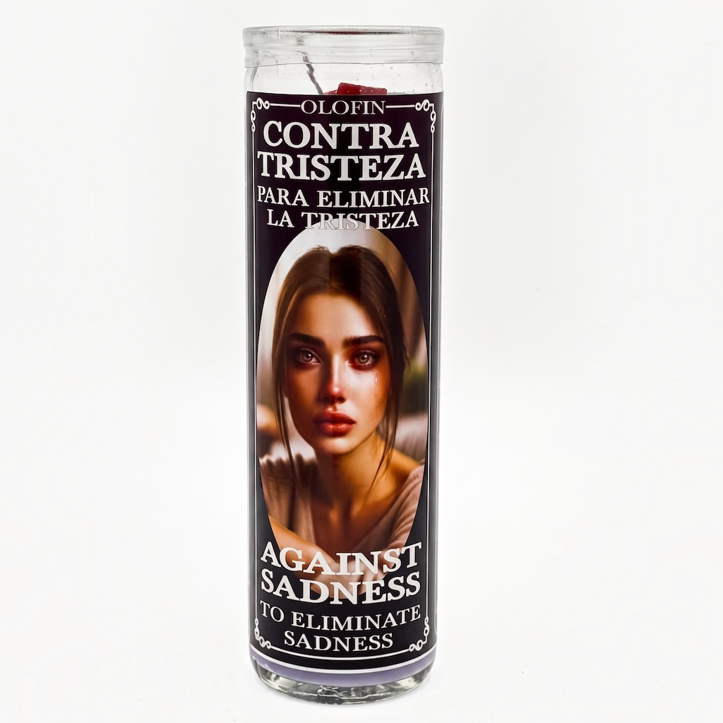A tall glass prayer candle with a printed label featuring a woman's face and Spanish text reading 'Olofin Contra Tristeza' and 'Against Sadness,' shown on a plain light background.