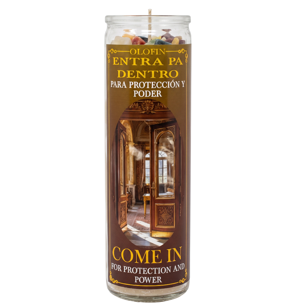 A tall glass prayer candle with a brown printed label reading 'OLOFIN ENTRA PA DENTRO PARA PROTECCIÓN Y PODER' and 'COME IN FOR PROTECTION AND POWER,' featuring a golden ornate doorway illustration and multicolored wax pieces visible at the top.