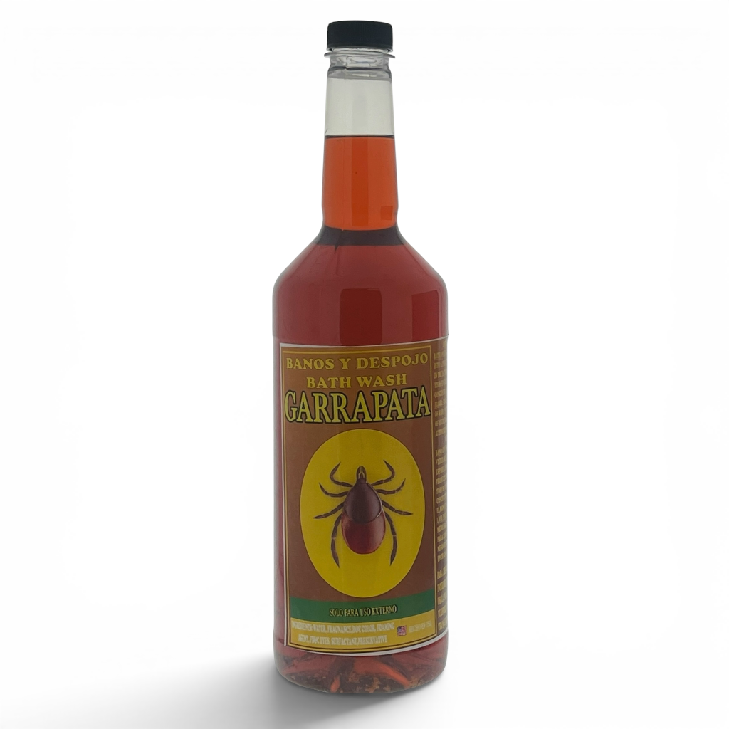 A bottle of Garrapata bath wash with a black cap and a brown label featuring a yellow circle and a spider graphic, filled with reddish-brown liquid, on a white background.