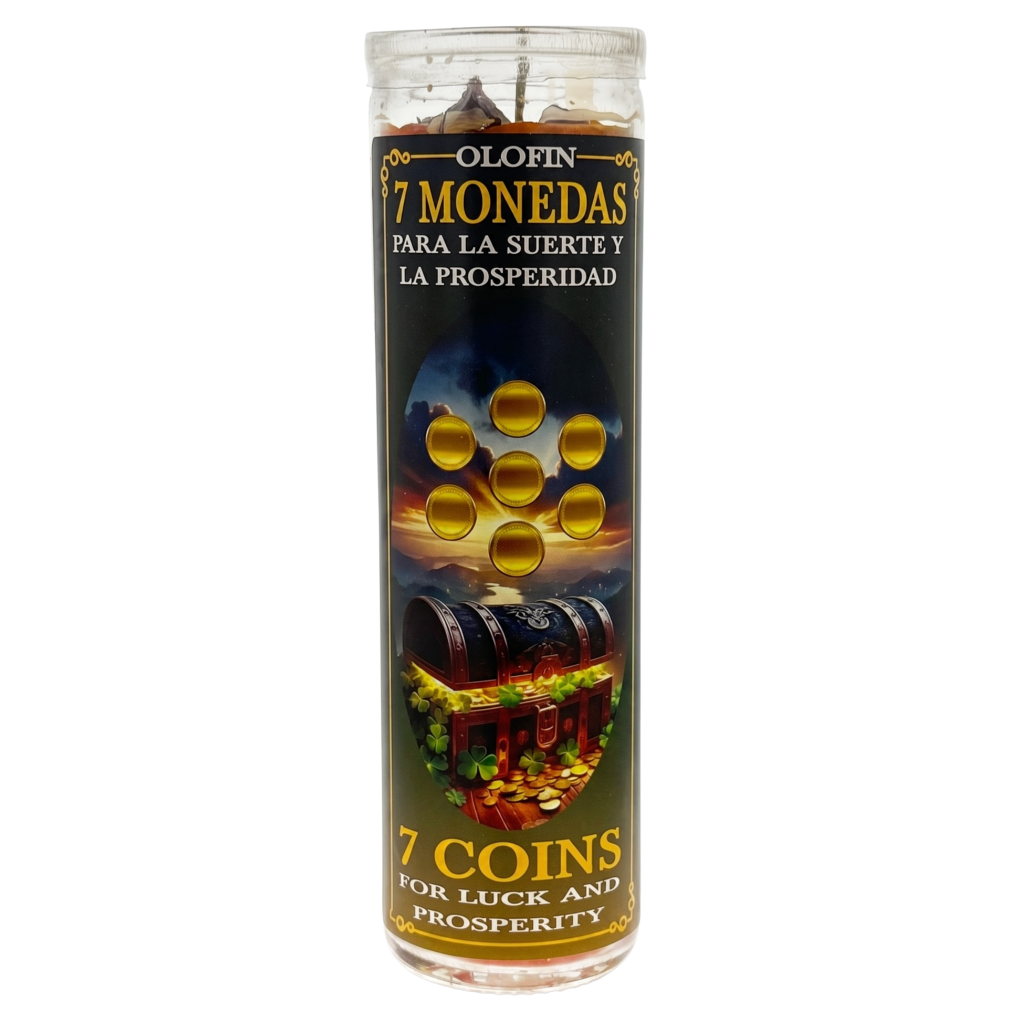 A tall glass jar candle labeled '7 Monedas Para La Suerte Y La Prosperidad' with a dark label featuring gold text, seven gold coin illustrations, and an image of a treasure chest over gold coins.