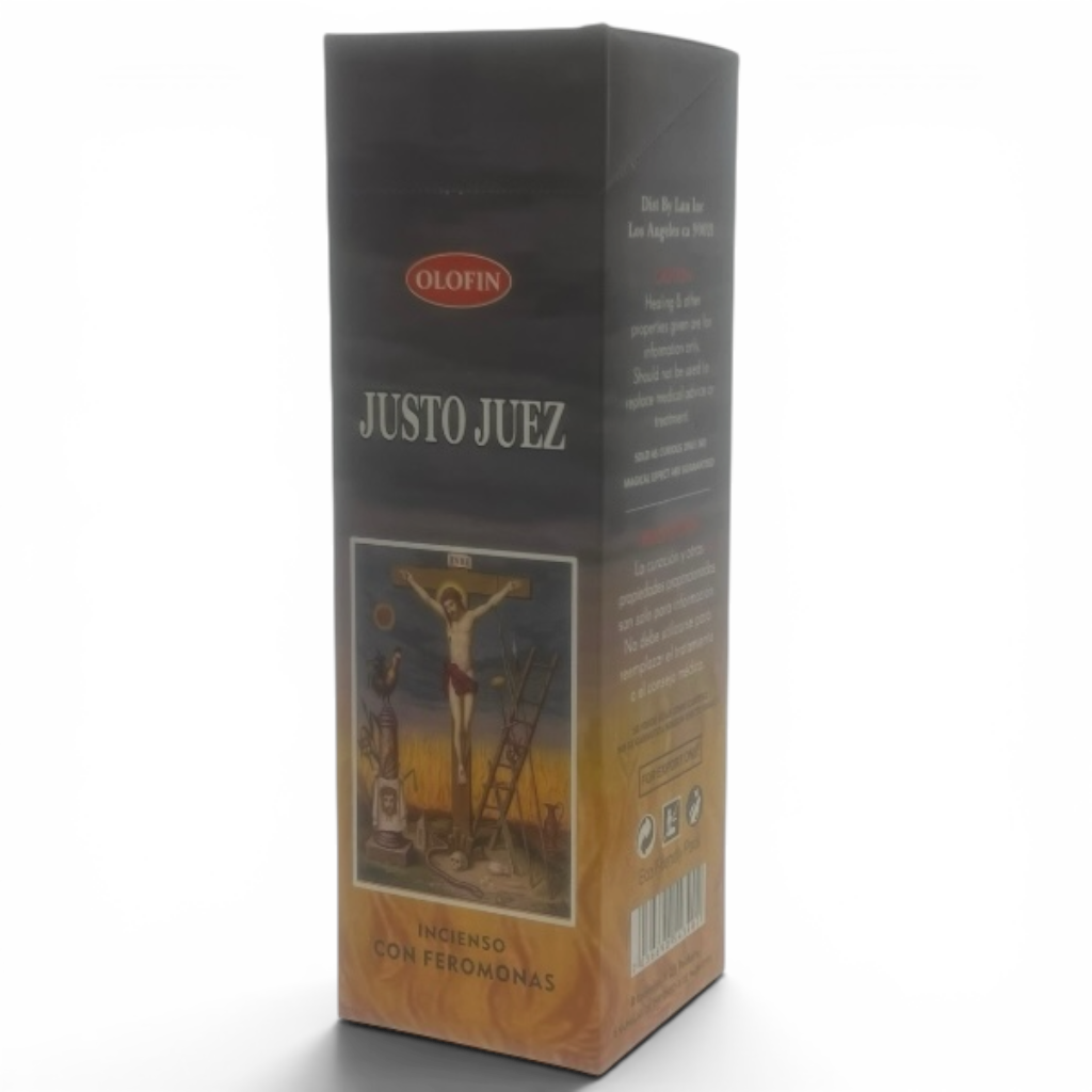 A tall rectangular incense box for Olofin Justo Juez, featuring a dark charcoal top half with white text and a warm brown and gold illustrated lower half showing a crucifix scene.