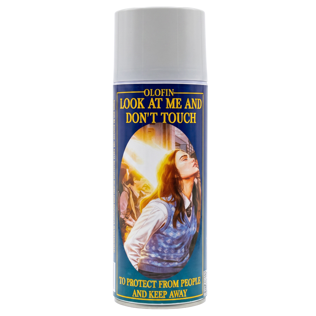 A single aerosol spray can of Olofin 'Look At Me And Don't Touch' personal defense spray, featuring a vintage-style label with a woman and warning text, on a solid white background.