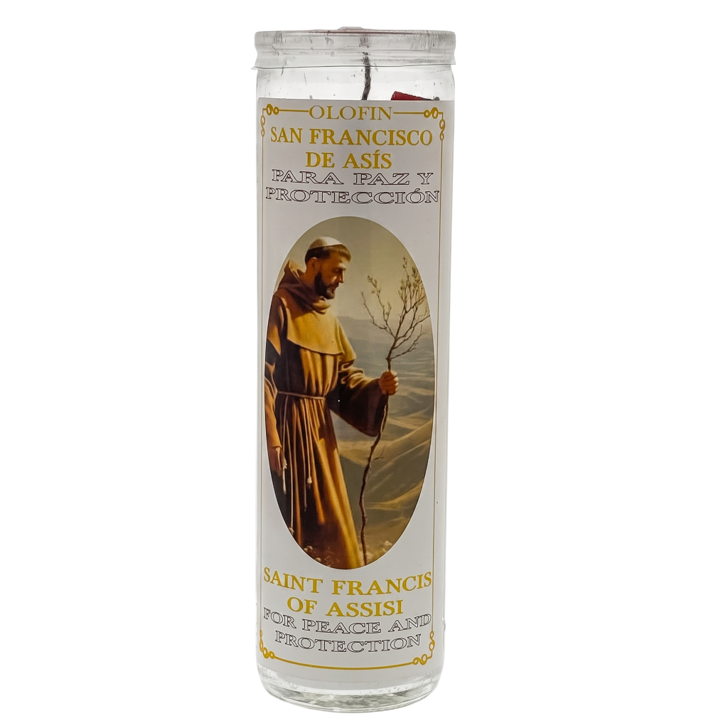A tall clear glass prayer candle with a white label featuring Saint Francis of Assisi in a brown robe, with Spanish and English text reading 'Orofin San Francisco de Asis' and 'Santa Paz y Protección'.
