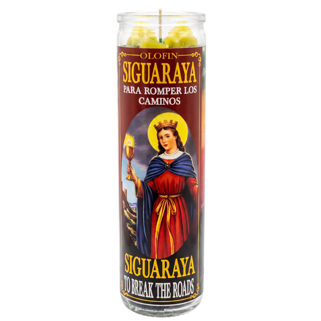 A tall glass prayer candle with a printed label featuring a religious figure in red and blue robes, labeled 'Olofin Siguaraya Para Romper Los Caminos' and 'Siguaraya To Break The Roads,' on a plain white background.