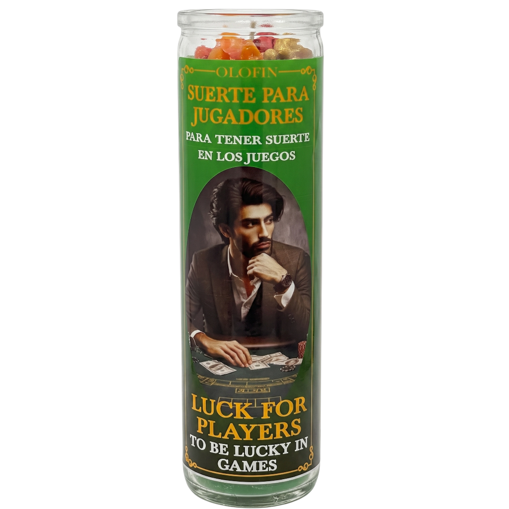 A tall glass jar candle with a green label featuring a portrait of a bearded man at a game table. The label reads 'OLOFIN SUERTE PARA JUGADORES' and 'LUCK FOR PLAYERS TO BE LUCKY IN GAMES,' with multicolored gummy candies visible inside a clear glass container on a white background.