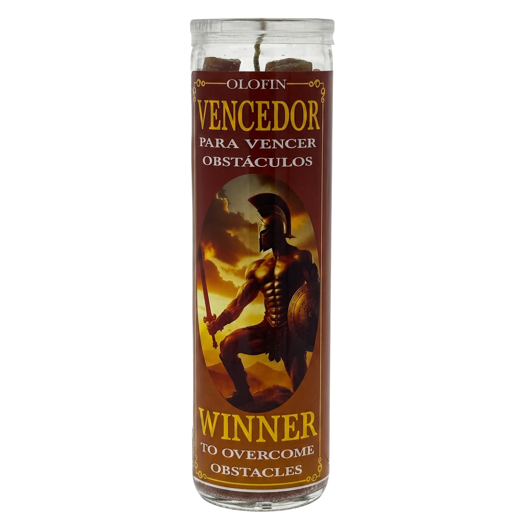 A tall glass jar candle with a brown label featuring a Spartan warrior illustration and Spanish text reading 'Olofin Vencedor para vencer obstáculos' and 'Winner to overcome obstacles.'.