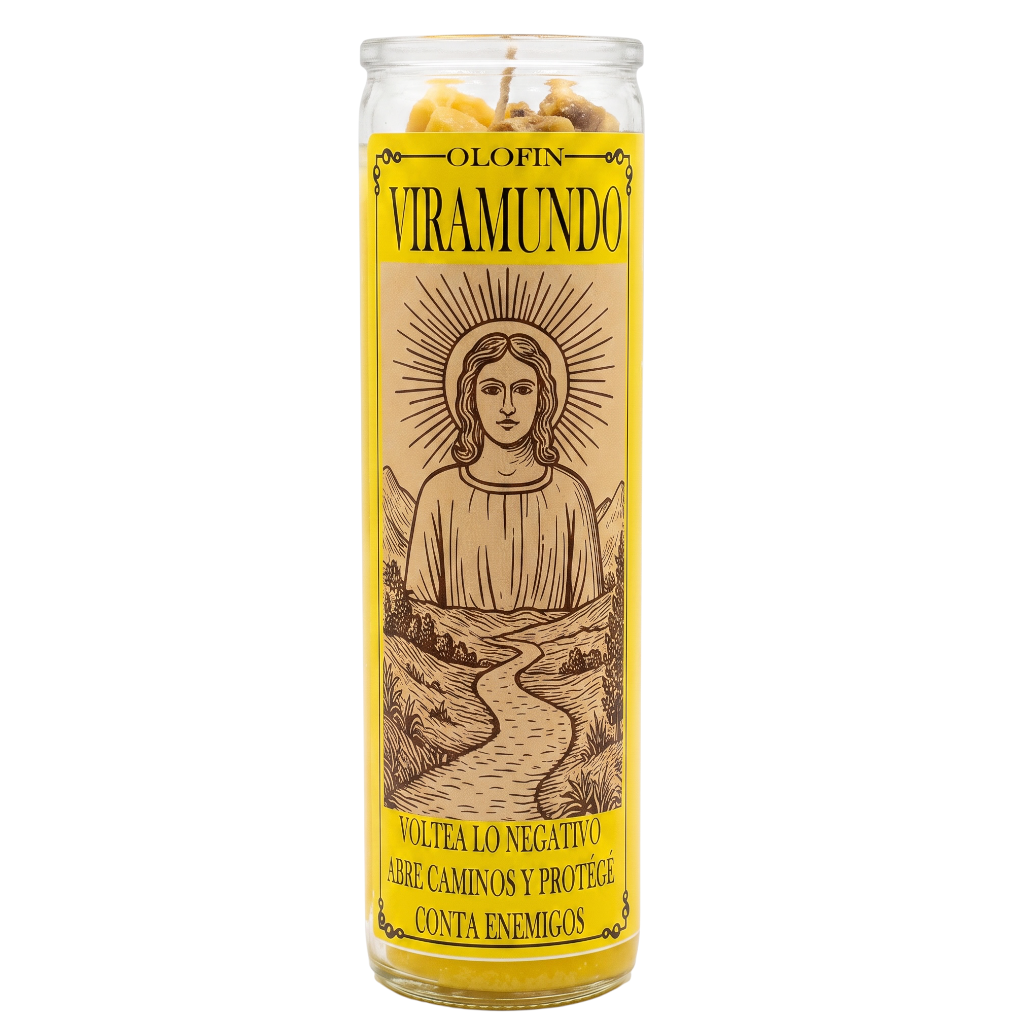 A tall glass jar candle with a yellow label featuring an illustration of the Virgin Mary and Spanish text, including 'OLFIN VIRAMUNDO'.