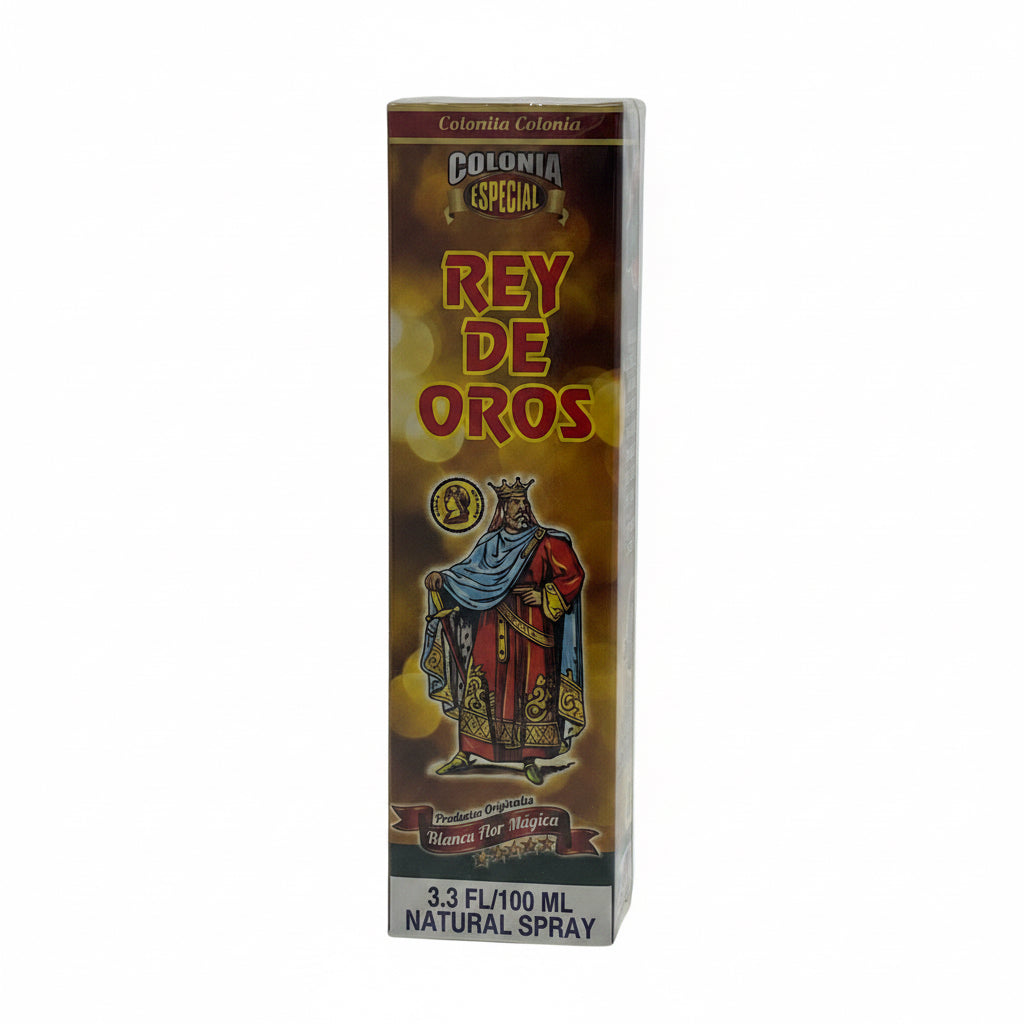 A product packaging for Rey de Oros with an illustration of a character wearing a crown and a blue robe, labeled as 'Rey de Oros' with text indicating it is a natural spray and has a volume of 2.5 fl oz/100 ml.
