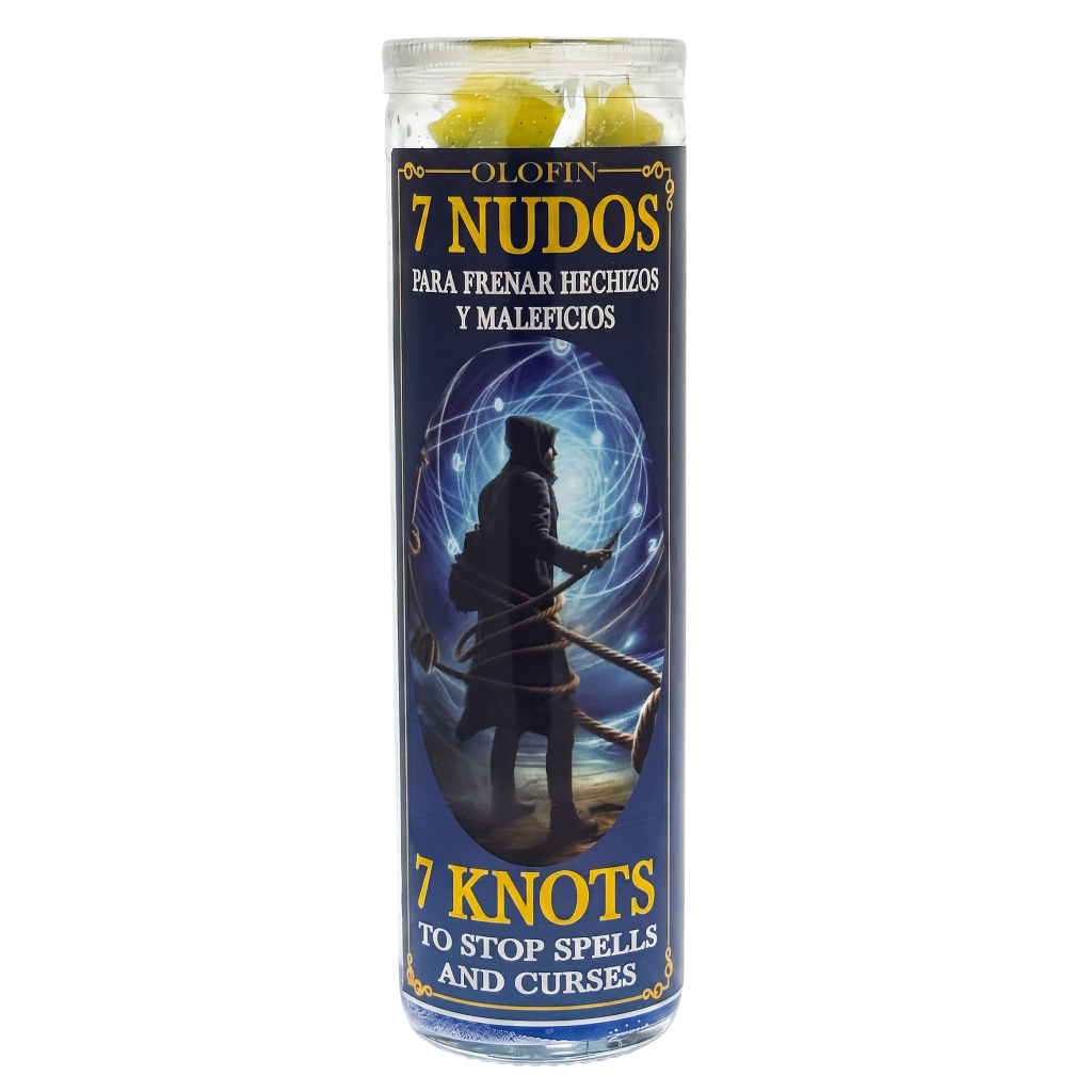 A tall glass jar candle labeled '7 Nudos' by Olofin, featuring a dark blue label with a silhouette of a hooded figure and the text 'Para frenar hechizos y maleficios' and '7 Knots to stop spells and curses.' The candle is shown on a plain white background.