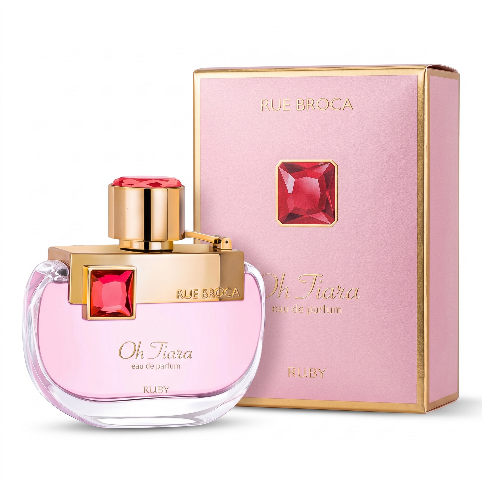 Pink perfume bottle with gold accents and matching pink packaging on a white background