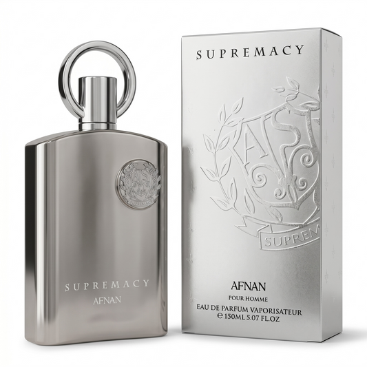 Silver perfume bottle and packaging with 'Supremacy' branding on a white background