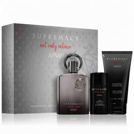 Afnan Supremacy perfume set with bottle, deodorant stick, and shower gel on a white background