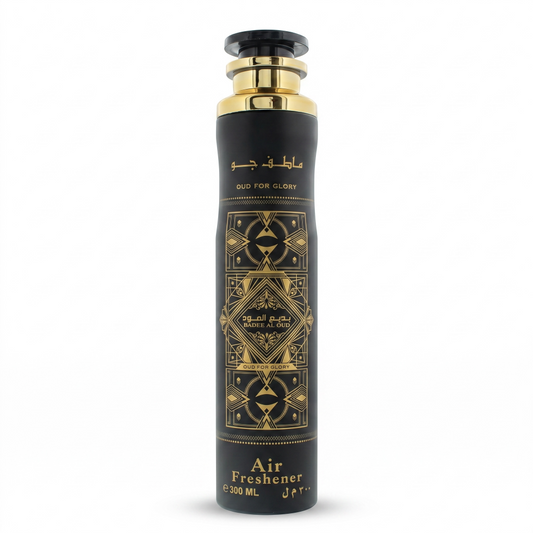 Black and gold air freshener bottle on a white background