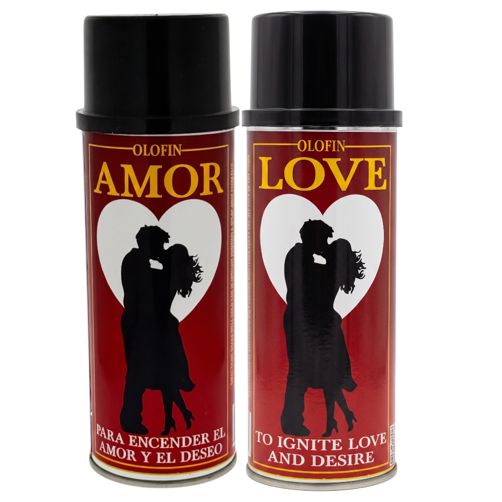 Two aerosol spray cans of Olofin Amor perfume or fragrance, featuring a red label with a black silhouette of a couple, a white heart, and gold and white text.