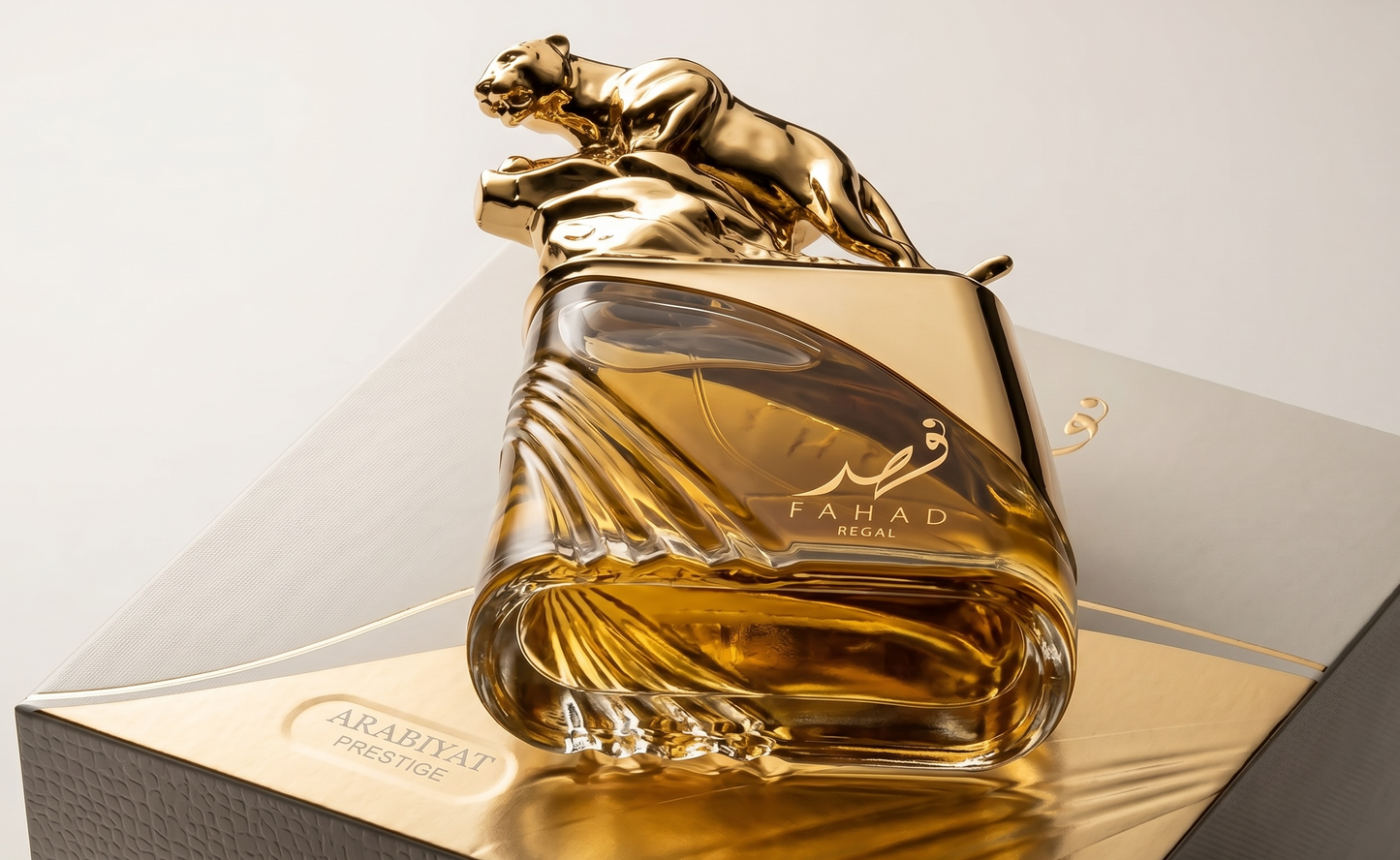 Gold and glass perfume bottle with panther design on a white background