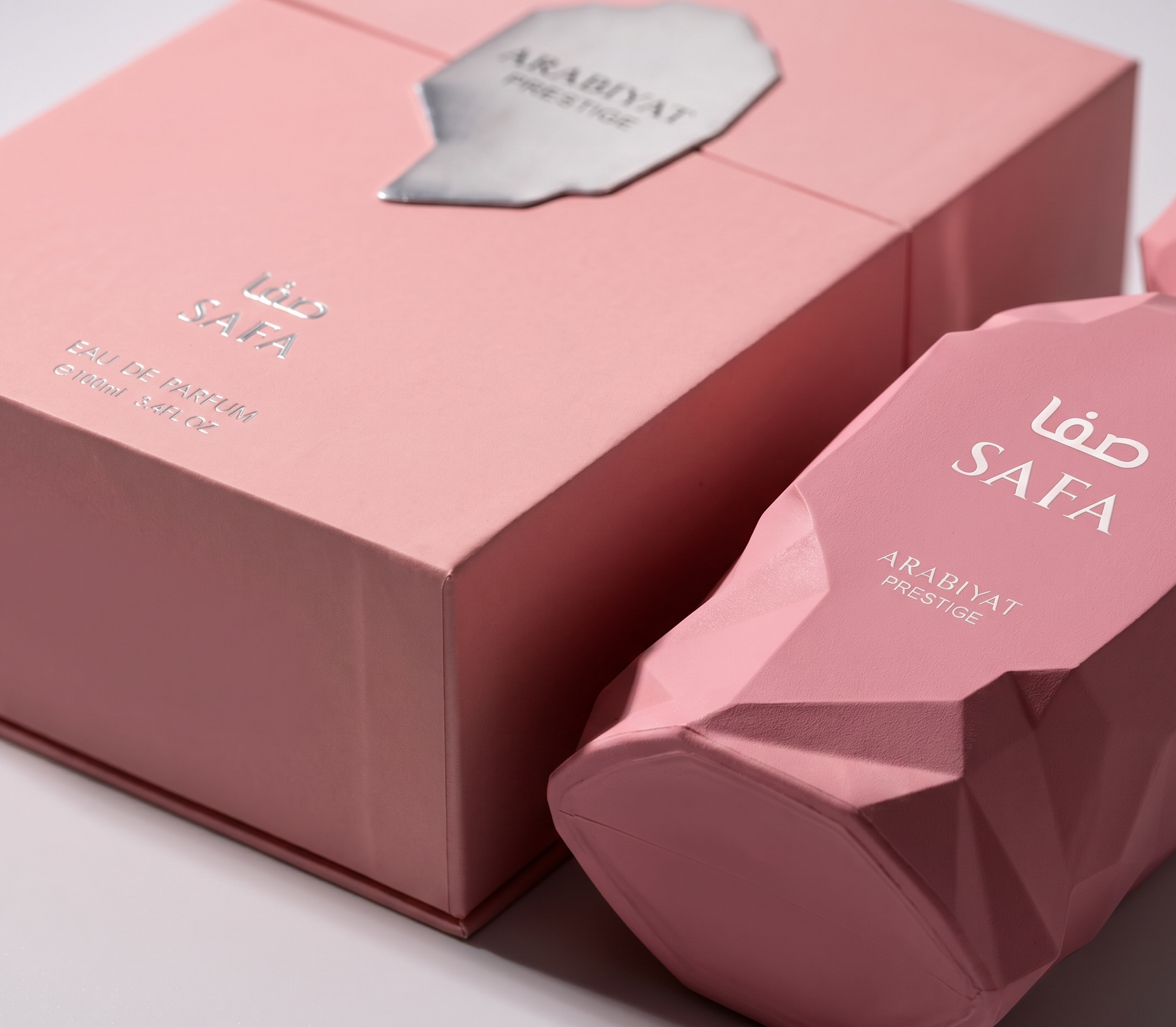 Pink packaging with 'ARABIAT' branding on a light background