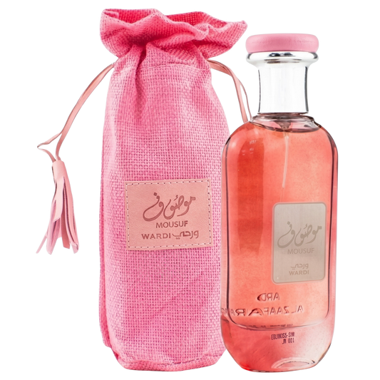 Pink perfume bottle and packaging with a label on a white background
