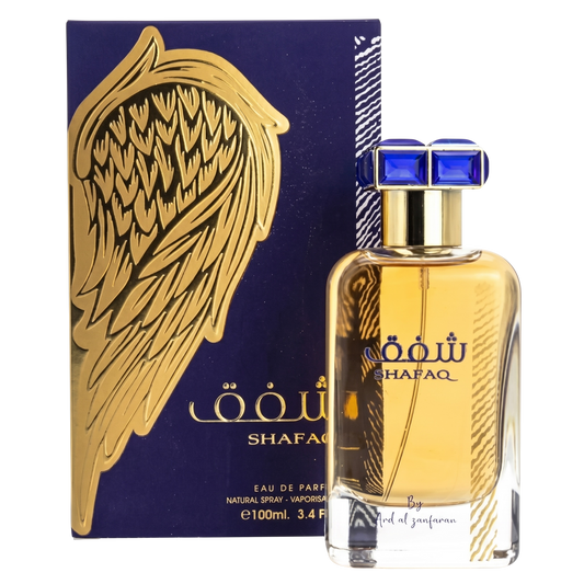 Shafaq perfume bottle with packaging featuring a gold wing design on a white background