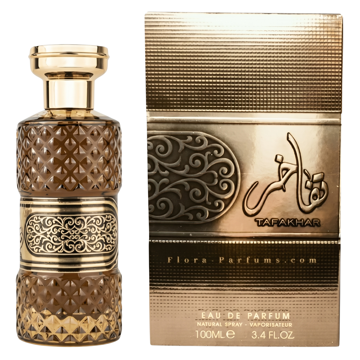 Decorative perfume bottle and packaging with intricate designs on a white background