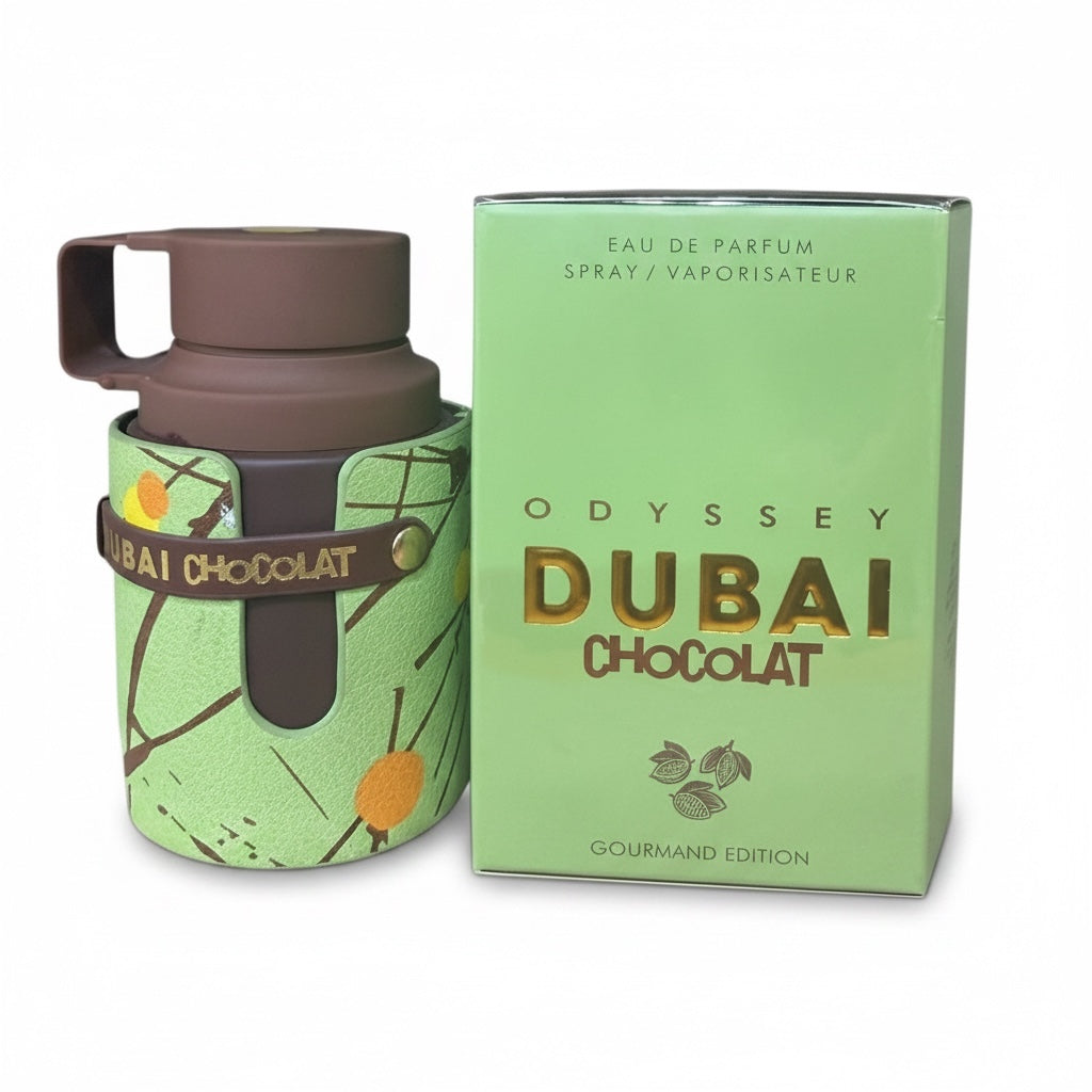 Green and brown Odyssey Dubai Chocolat perfume bottle and packaging on a white background