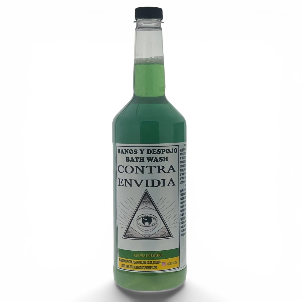 A green glass bottle of bath wash with a black cap and a white label featuring a pyramid and eye design. The label reads 'BATH WASH CONTRA ENVIDIA'.