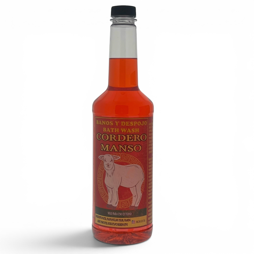 A bottle of Cordero Manso bath wash with a red liquid and a red label featuring a sheep illustration, on a white background.