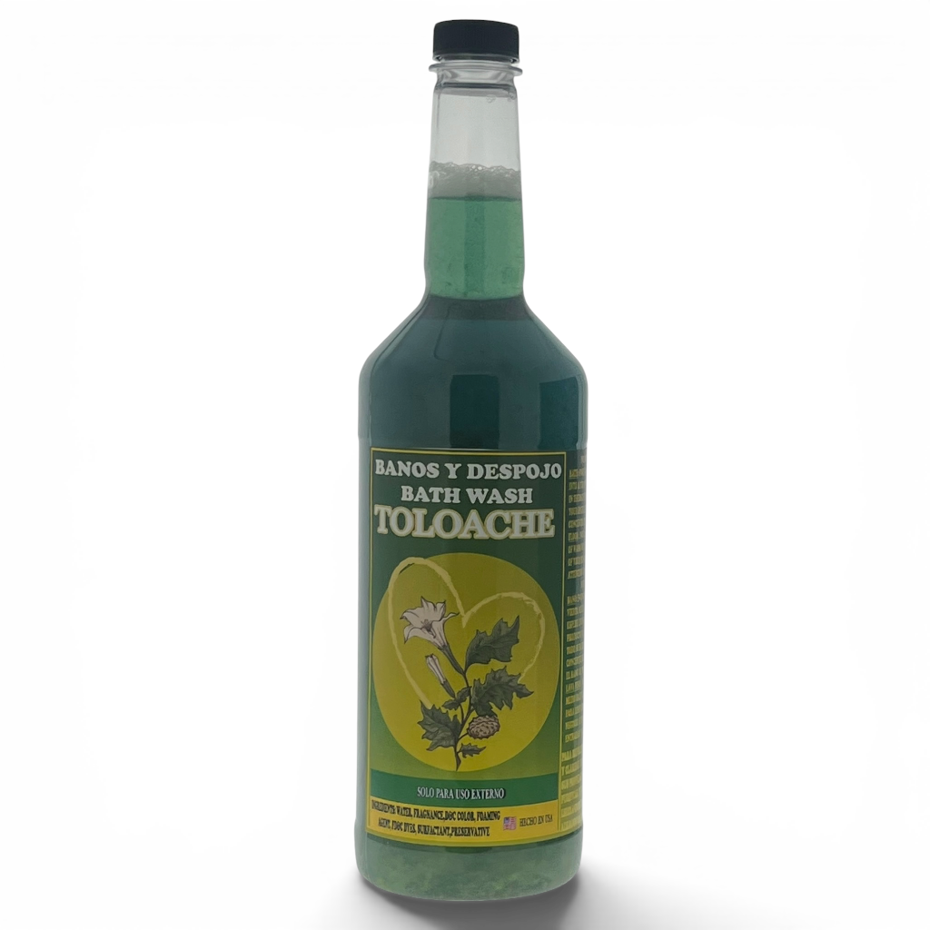 A bottle of Toloache bath wash with a green liquid inside, featuring a green and yellow label with illustrations of the toloache plant, set against a plain white background.