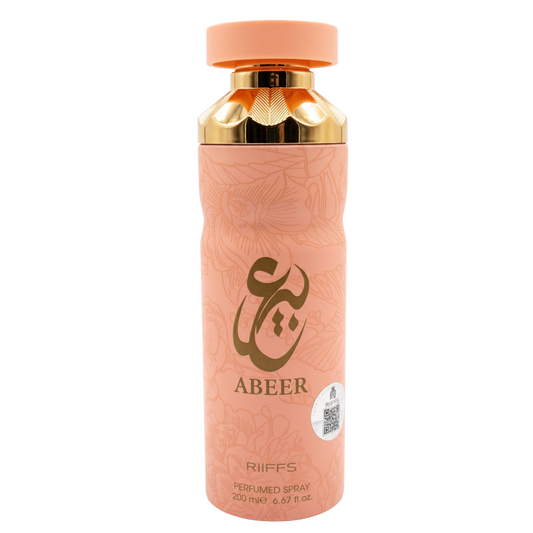 Pink perfume bottle with gold cap on a white background