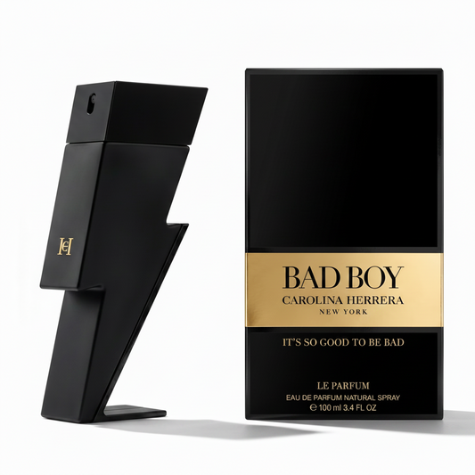 Black and gold Carolina Herrera Bad Boy perfume bottle and packaging on a white background