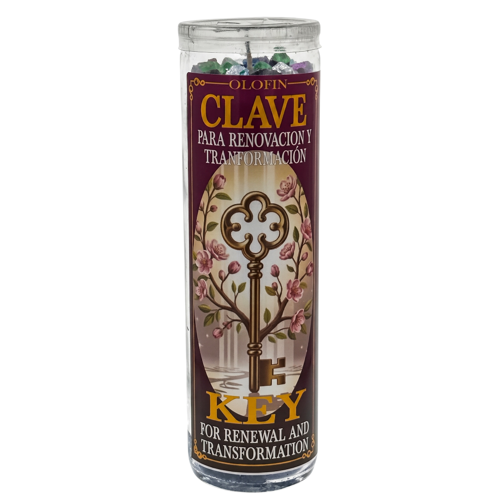 A tall glass jar candle with a clear lid and a decorative label reading 'Olén Clave Para Renovación y Transformación' and 'Key for Renewal and Transformation,' featuring a large ornate key over a floral tree design.