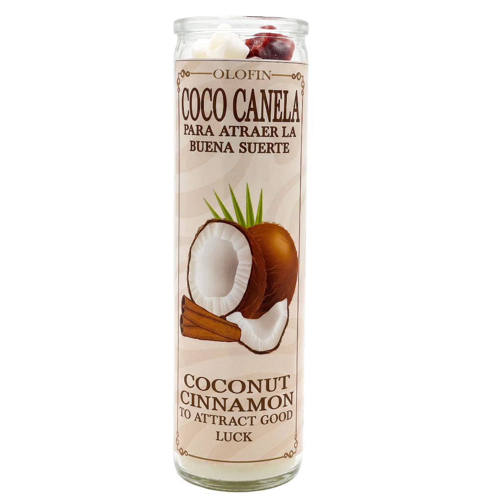 A tall glass jar candle with a beige label featuring a coconut and cinnamon illustration. The label reads 'Olofin Coco Canela' and 'Coconut Cinnamon To Attract Good Luck'.