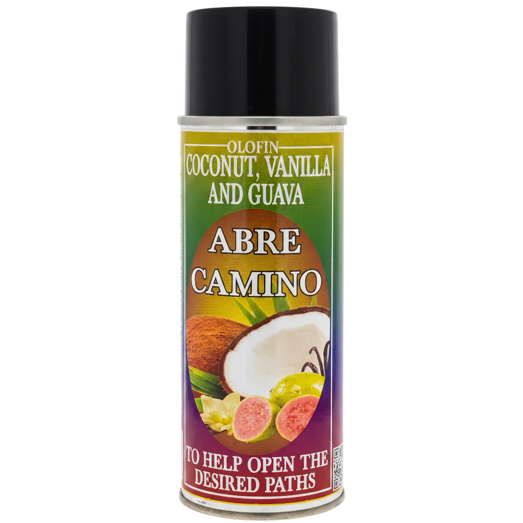 A spray can of Olofin Abre Camino, coconut, vanilla, and guava scented spray, featuring a black cap and a colorful label with illustrations of a coconut and fruits, on a white background.