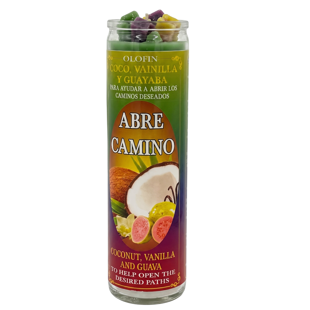 A tall glass jar candle with a colorful label reading 'ABRE CAMINO' and showing coconut, vanilla, and guava imagery, photographed on a plain white background.