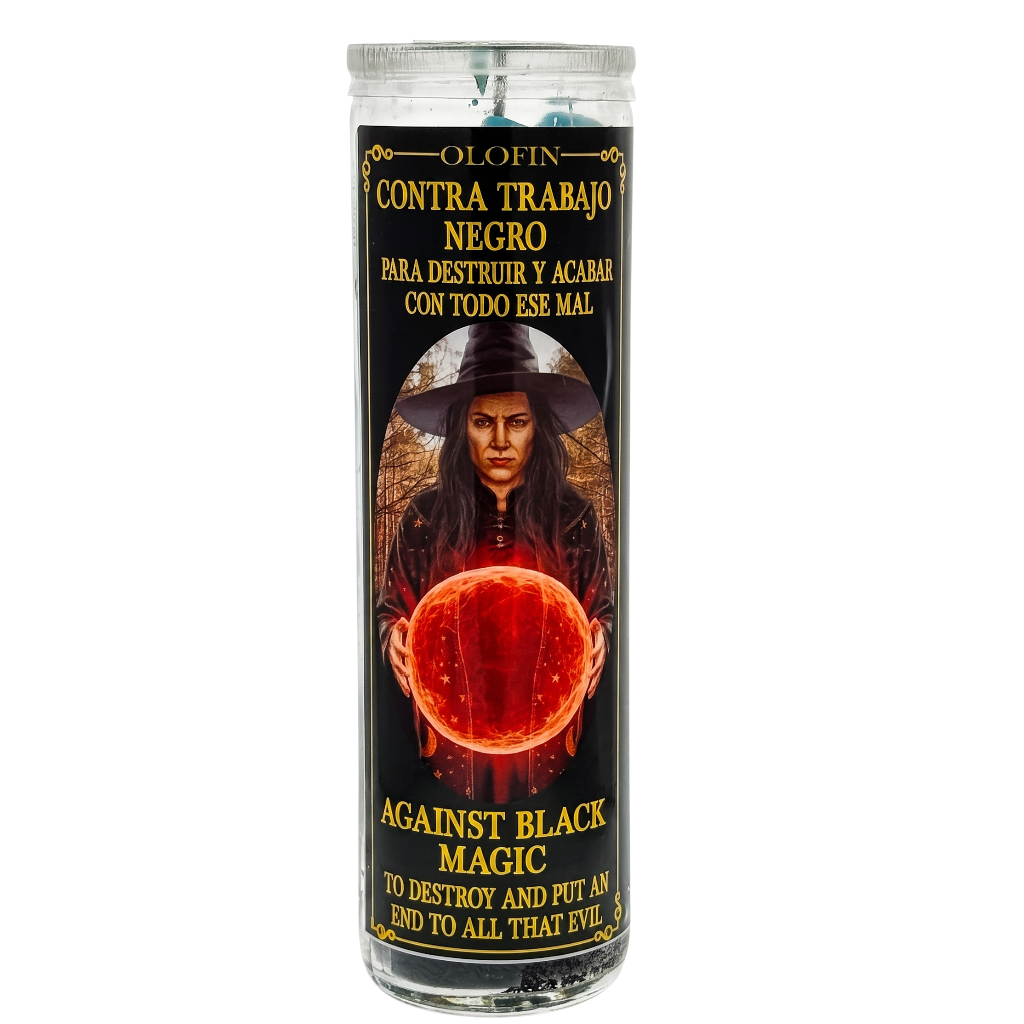 A tall glass prayer candle with a black label featuring a witch holding a glowing red orb, with Spanish and English text reading 'Olofin' and 'Against Black Magic.'.