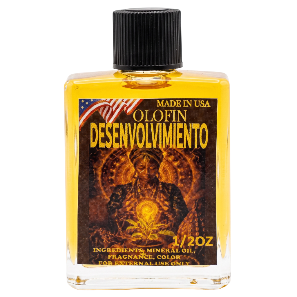 A 1/2 oz clear glass bottle of Olofin Devolvimiento fragrance oil with a black ribbed cap, filled with golden yellow oil. The front features a detailed label with a dark, fiery graphic of a figure and the text 'MADE IN USA OLOFIN DESENVOLVIMIENTO'.