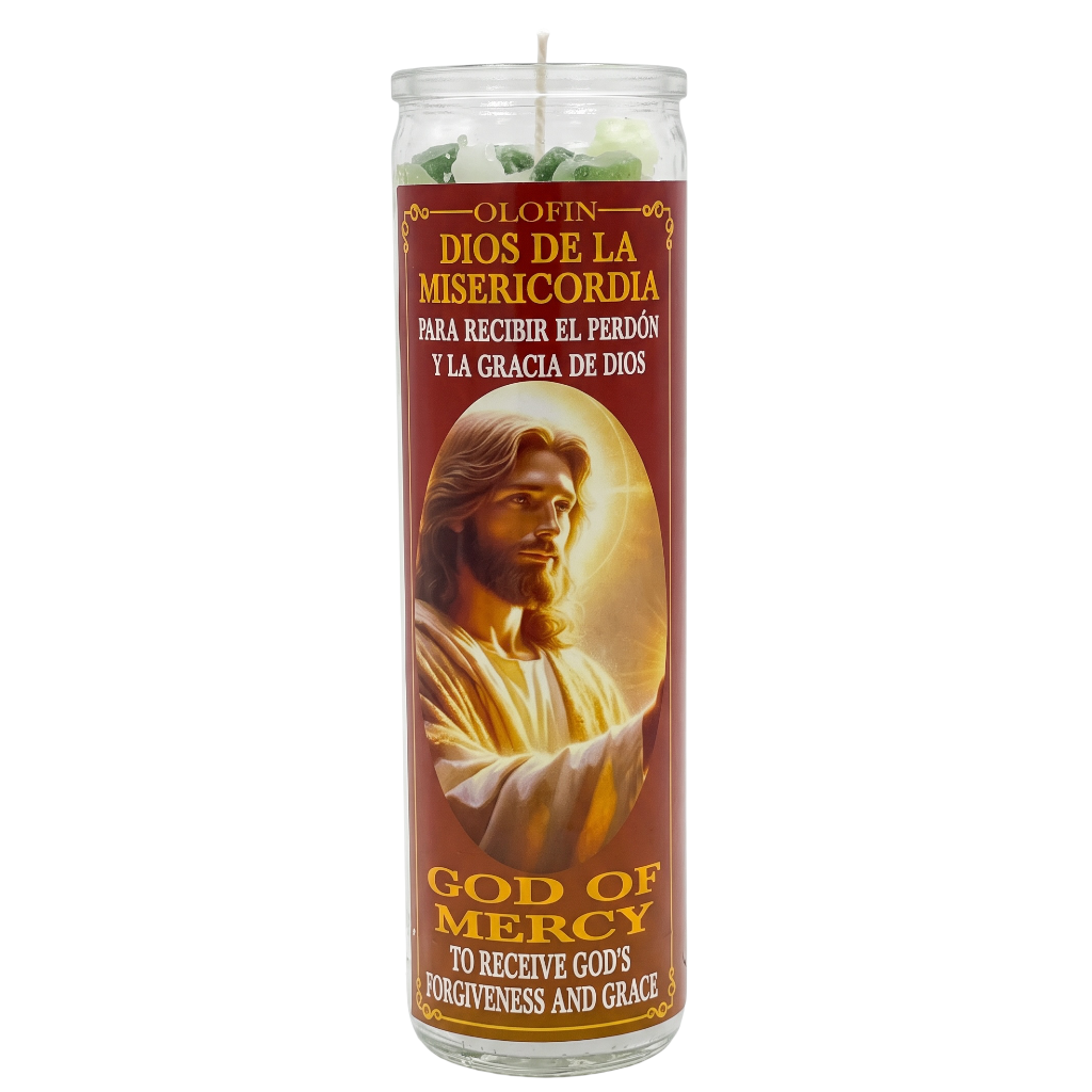 A tall glass jar prayer candle with a Spanish religious label featuring an image of Jesus and the text 'OLOFIN DIOS DE LA MISERICORDIA' and 'GOD OF MERCY'.