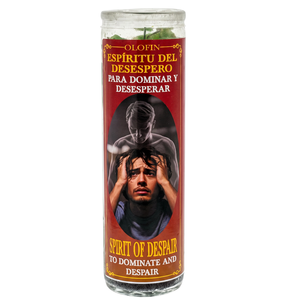 A tall glass jar candle with a red label featuring the Spanish text 'ESPÍRITU DEL DESPESERO PARA DOMINAR Y DESPESERAR' and 'SPIRIT OF DESPAIR TO DOMINATE AND DESPAIR,' plus an illustration of a distressed man. Green leaves are visible at the top.