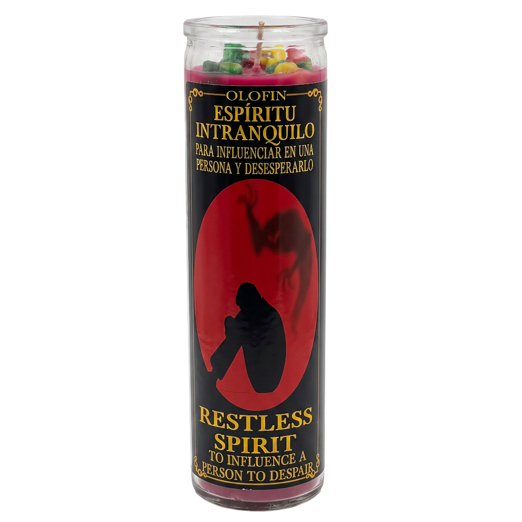 A tall glass jar candle labeled 'Olofin Espíritu Intranquilo / Restless Spirit' with a black label, red oval graphic, and multicolored wax pieces visible at the top, shown on a plain white background.