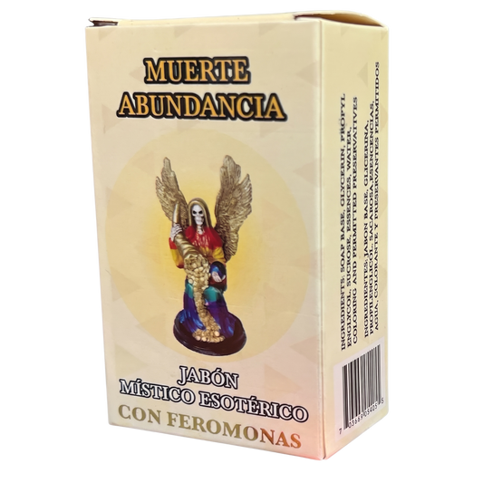 Box of 'Muerte Abundancia' with a figurine on a beige background