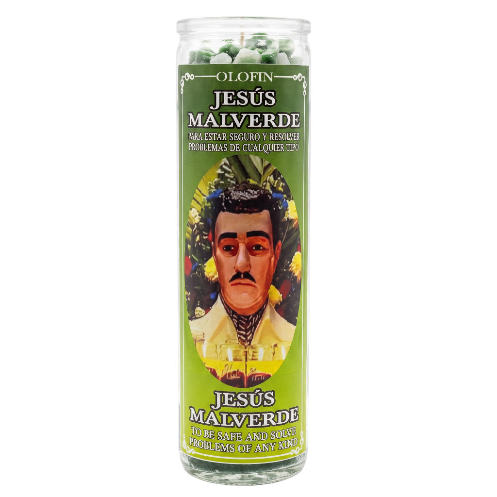 A tall glass jar candle with a green label featuring a portrait of Jesús Malverde. The candle contains white and green wax pieces visible at the top, and the label reads 'OLOFIN JESÚS MALVERDE'.