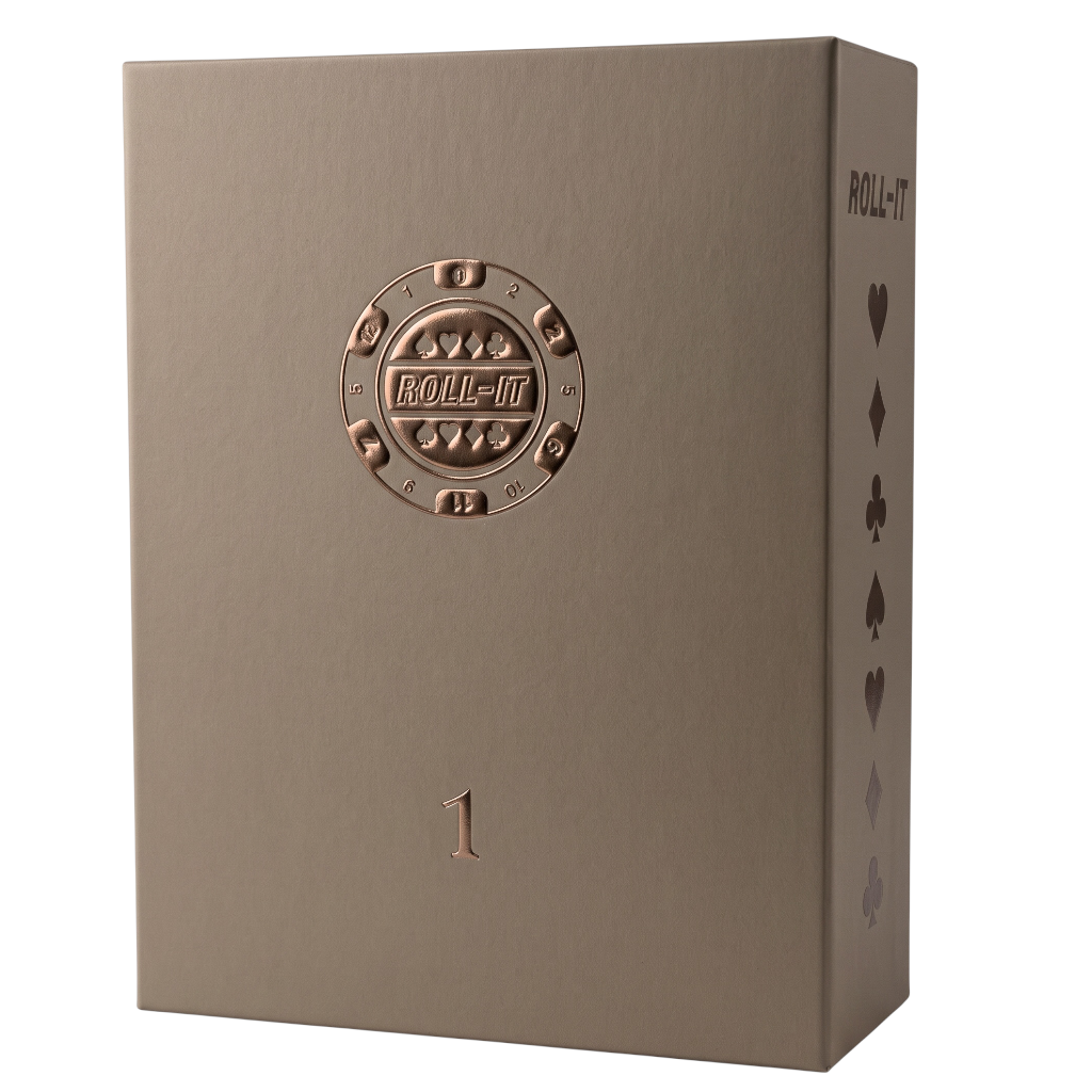 A rectangular roll-it playing card deck box in a warm taupe-brown color, featuring embossed rose-gold metallic details including a circular emblem on the front, a card number '1' near the bottom, and playing card suit icons on the side.