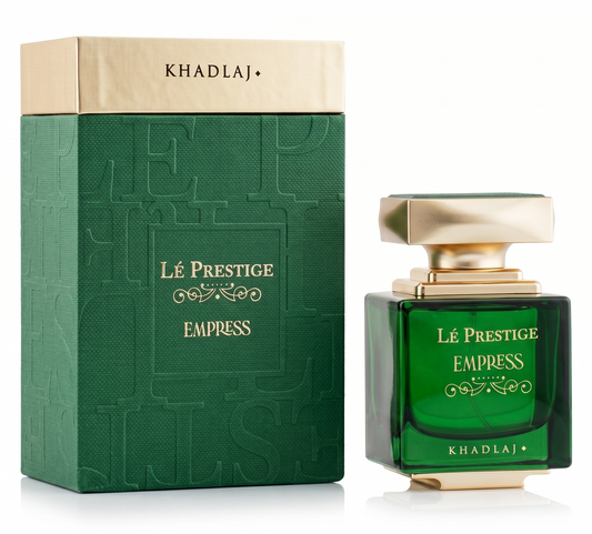 Green perfume bottle and packaging with 'Khadlaj' branding on a white background