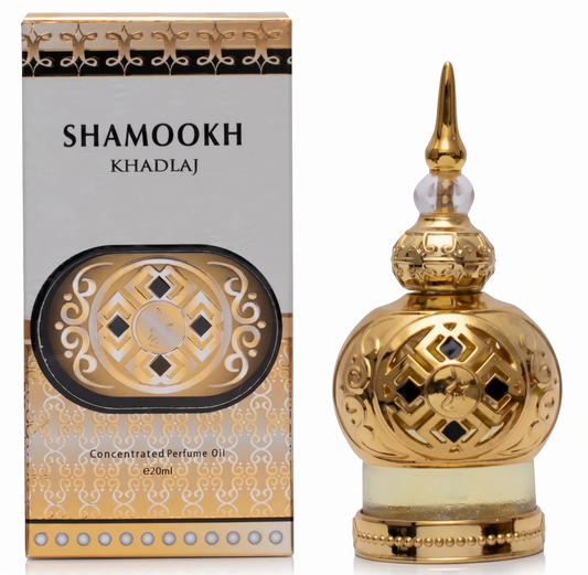 Gold and white concentrated perfume oil bottle with packaging labeled 'Shamookh Khadlaj' on a white background.
