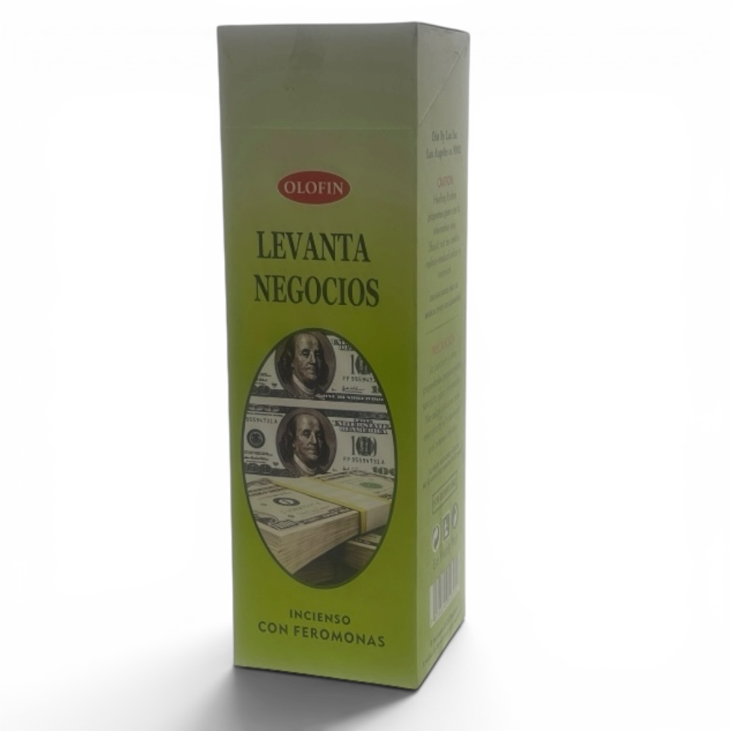 A tall rectangular green box of Olofin Levanta Negocios incienso con feromonas, featuring a circular cutout of stacks of hundred-dollar bills on the front, set against a plain white background.