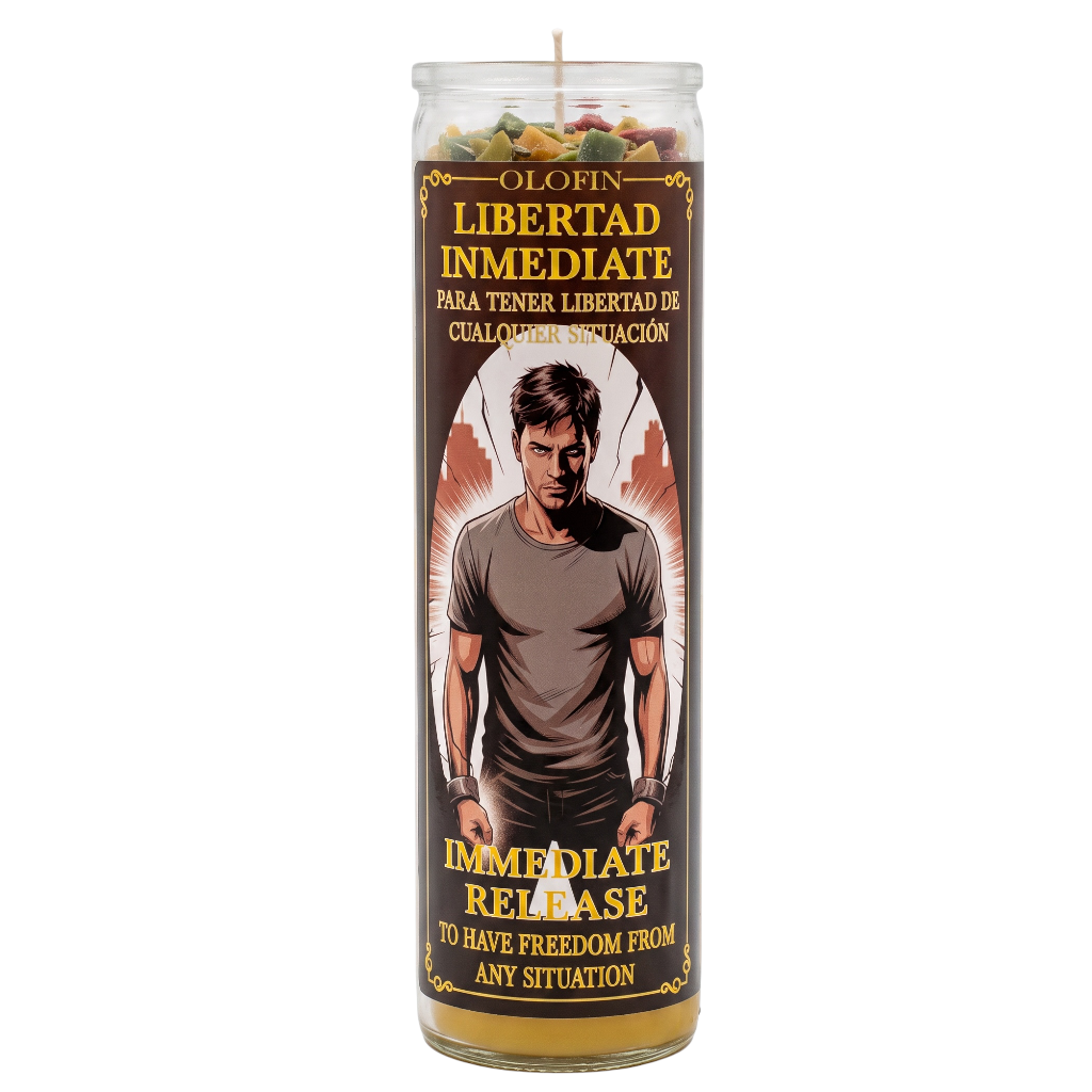 A tall glass prayer candle with a printed label featuring an illustrated man and Spanish text reading 'Olofin Libertad Inmediata' and 'Immediate Release.' The candle is shown upright on a plain white background.