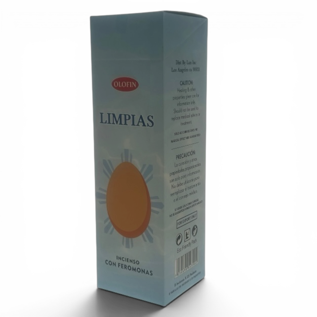 A tall rectangular product box for Olfin Limpias incienso con feromonas, shown at a three-quarter angle on a white background. The box is light blue with a large orange sun graphic and black text.
